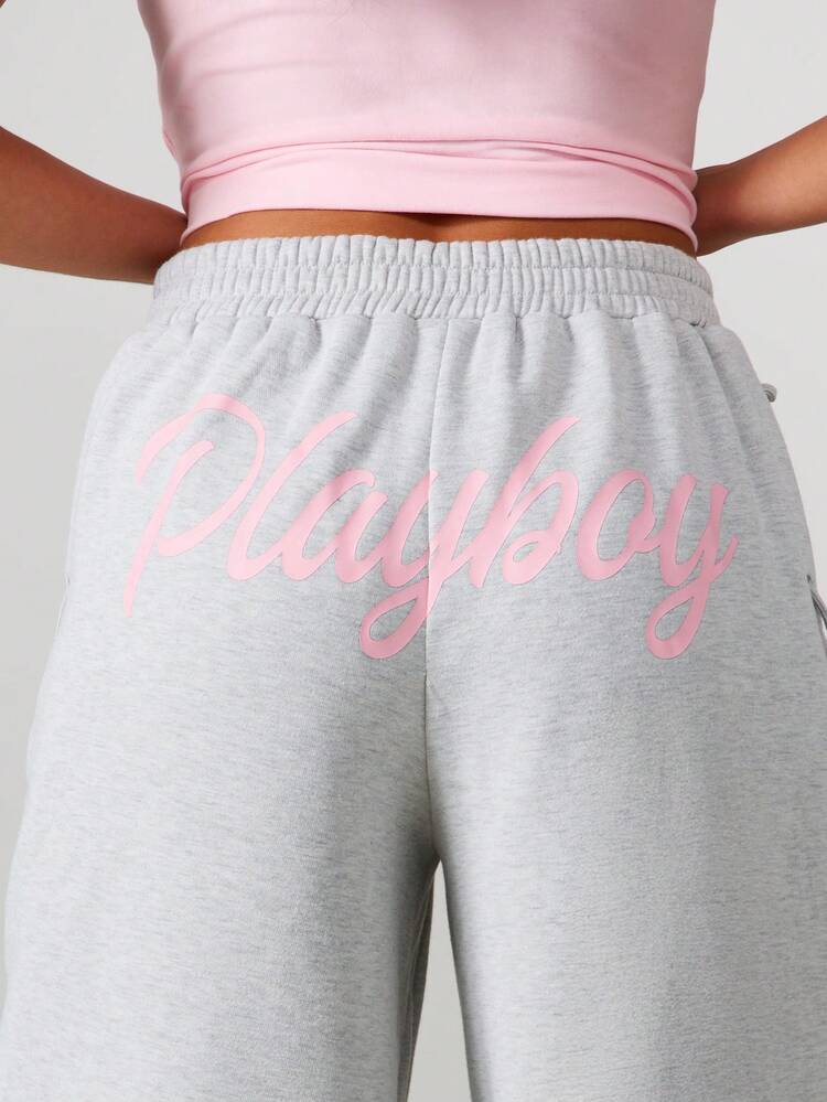 Missguided x Playboy Spodnie dresowe z szerokimi nogawkami i sznurowaniem po bokach, zapewniające wygodę w salonie, z logo Bunny