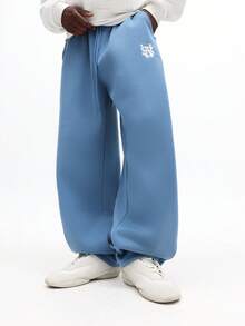 Quần nỉ ống đứng dáng rộng SUMWON với dây rút ở eo và túi bên hông, mang lại sự thoải mái thường ngày. Màu trơn. - Màu xanh lam - Xem 1