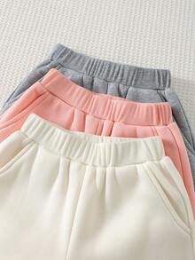 Cozy Pixies 女童保暖加厚针织纯色宽松抽绳蝴蝶结运动裤，舒适休闲直筒裤型，适合日常穿着、上学、休闲、姐妹装、室内、室外、运动、派对、秋冬季节度假等场合。可爱童装运动裤，女童蝴蝶结裤，女童蝴蝶结运动裤，儿童女童裤