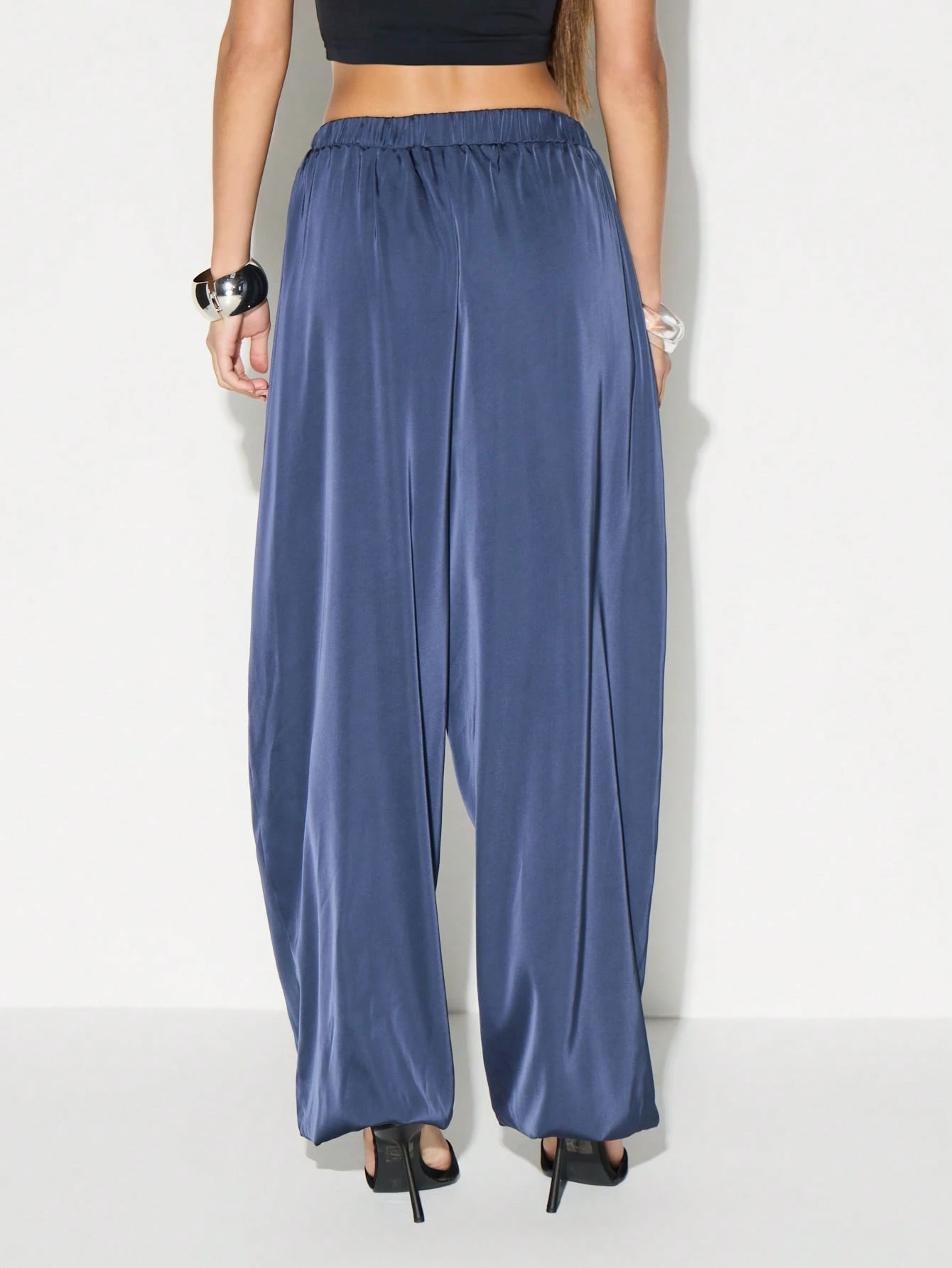 KIZN Pantaloni jogger in raso con tasche