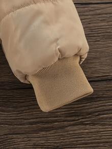 女童黑色连帽加厚高腰罗纹修身时尚羽绒服，秋冬季休闲百搭外套