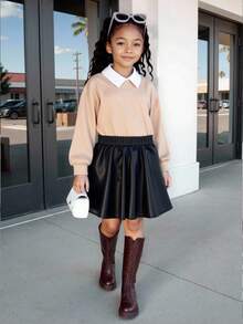 Kleine Mädchen Waffel-Stoff 2-in-1 Top mit Kontrasthem dkragen, kombiniert mit schwarzem PU-Leder Rock, einfach und modisch, geeignet für Ausflüge, minimalistischer Stil