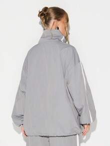 KIZN Lightweight Reflective Windbreaker Jacket With Zip Closure And Side Stripe Detail For Women - Dark Grey - View 2