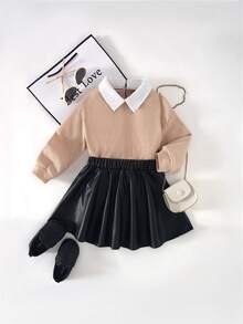 Kleine Mädchen Waffel-Stoff 2-in-1 Top mit Kontrasthem dkragen, kombiniert mit schwarzem PU-Leder Rock, einfach und modisch, geeignet für Ausflüge, minimalistischer Stil