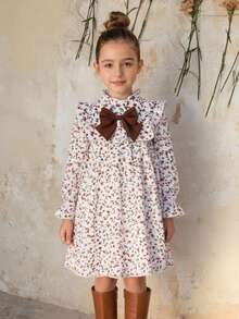 SHEIN Emery Rose Kids Đầm dài tay dáng rộng dễ thương cho bé gái, họa tiết hoa màu mơ, thắt nơ, thích hợp cho kỳ nghỉ hè; Đầm hoa mùa thu, đầm thu màu trắng ngà điểm xuyết đỏ cháy; Đầm xuân thu cho bé gái; Đầm hoa nhún bèo tay dài, chi tiết nơ to và xếp nếp cho bé gái; Đầm hoa tay dài, cổ bèo nhún, thắt nơ to cho bé gái; Đầm chữ A dễ thương, đầm nơ; Đầm in họa tiết hoa mùa thu cho bé gái. - Màu be - Xem 9