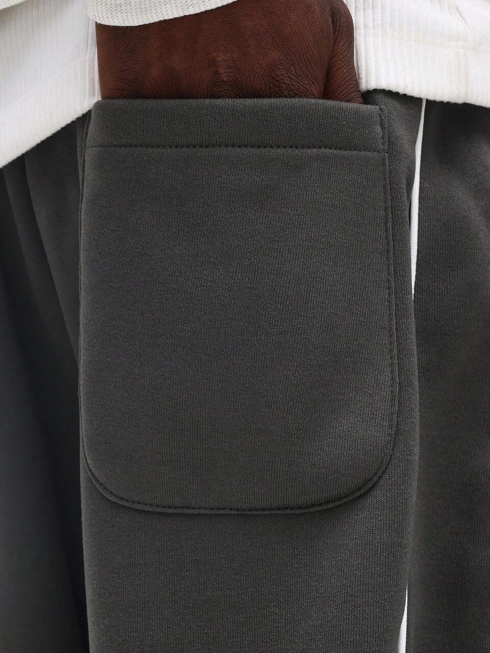 Pantalon de survêtement à jambes larges avec design de couture unie SUMWON