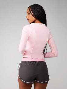 Missguided x Playboy 适合运动训练的长袖修身短款上衣，配有插肩袖 - 粉色 - 查看 2