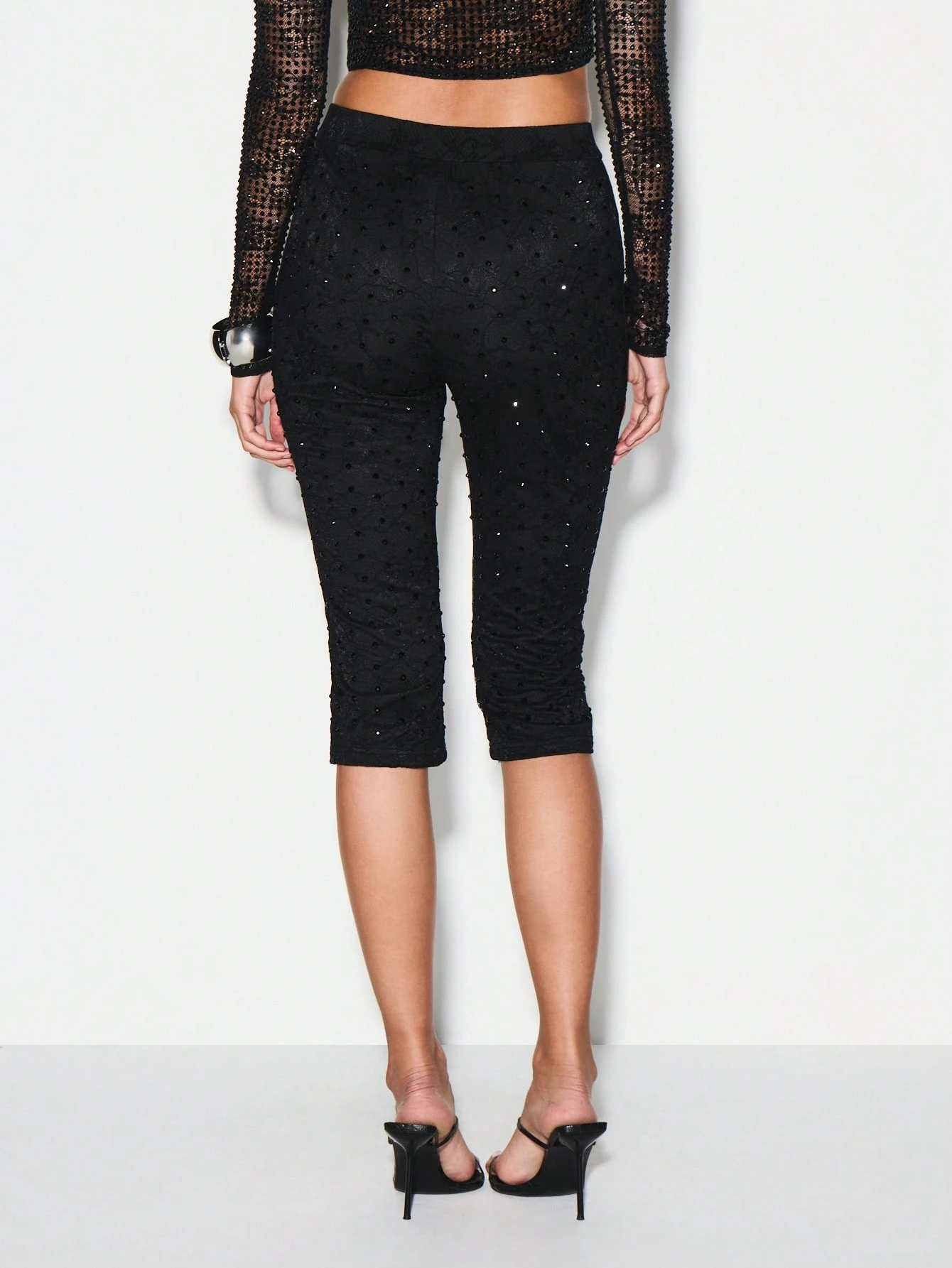 KIZN Leggings Capri in pizzo con paillettes