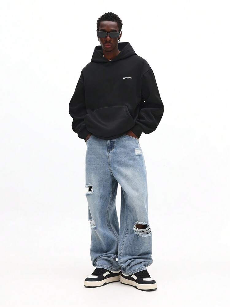 Distressed Wide Leg Jeans With Ripped Details