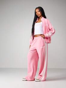 Missguided x Playboy Oversized Wide Leg Jogger Sweatpants With Side Stripe Detail For Casual Loungewear