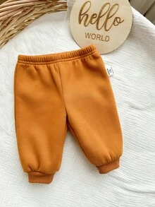 SHEIN Neugeborenen Baby Jungen süßer Farbblock Cartoon Muster Langarm Sweatshirt & Hose mit elastischem Bund Set, Herbst/Winter