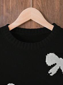 SHEIN 1pc Girls' Sweater Dress, Cute Style, Black Bow Jacquard Pattern, Round Neck, Regular Sleeve, Cuff & Hem Cinched, Regular Thickness, Elegant Knit Dress In Ivory, Intellectual & Flattering Slim Fit, Suitable For Spring, Autumn & Winter Bow Clothes Bows On Clothes Black Sweater With White Bow Print Sweater K Pop Sweater With Bows Black And White Sweater Sumwon Wednesday Addams - Black - View 3