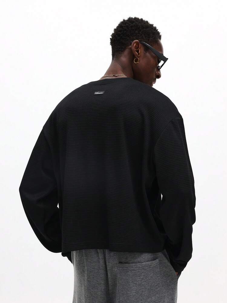 Top ras du cou côtelé à manches longues