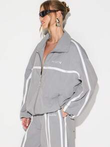 KIZN Lightweight Reflective Windbreaker Jacket With Zip Closure And Side Stripe Detail For Women - Dark Grey - View 1
