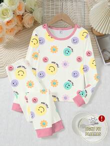 女孩可爱笑脸印花针织弹力面料长袖上衣和裤子两件套睡衣套装，米色带粉色饰边