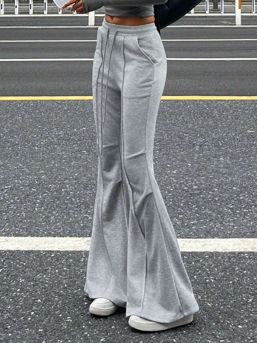 DAZY Pantalones deportivos acampanados con línea dividida para mujer en otoño