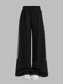 少女蝴蝶结装饰宽松黑色休闲裤，百搭时尚，适合日常穿着，秋季也适合日常/冬季穿着，街头风，居家舒适，秋冬风格。黑色宽松运动裤，适合新年、日常、庆祝活动、秋冬季穿着，轻松舒适，秋冬叠穿，时尚有型。 - 黑色 - 查看 10