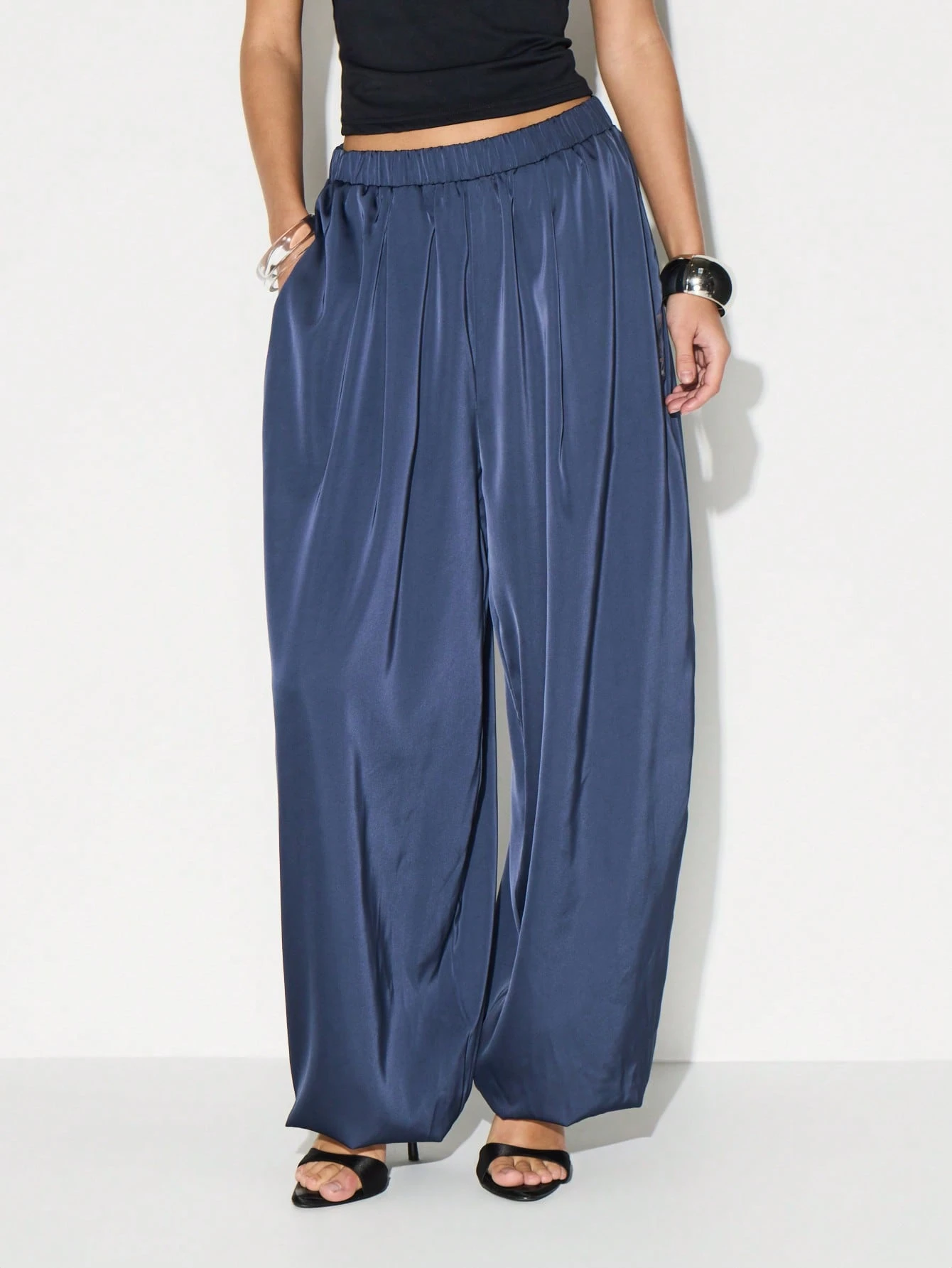 KIZN Pantaloni jogger in raso con tasche