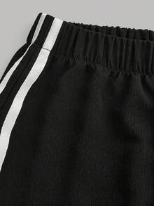 少女蝴蝶结装饰宽松黑色休闲裤，百搭时尚，适合日常穿着，秋季也适合日常/冬季穿着，街头风，居家舒适，秋冬风格。黑色宽松运动裤，适合新年、日常、庆祝活动、秋冬季穿着，轻松舒适，秋冬叠穿，时尚有型。 - 黑色 - 查看 3