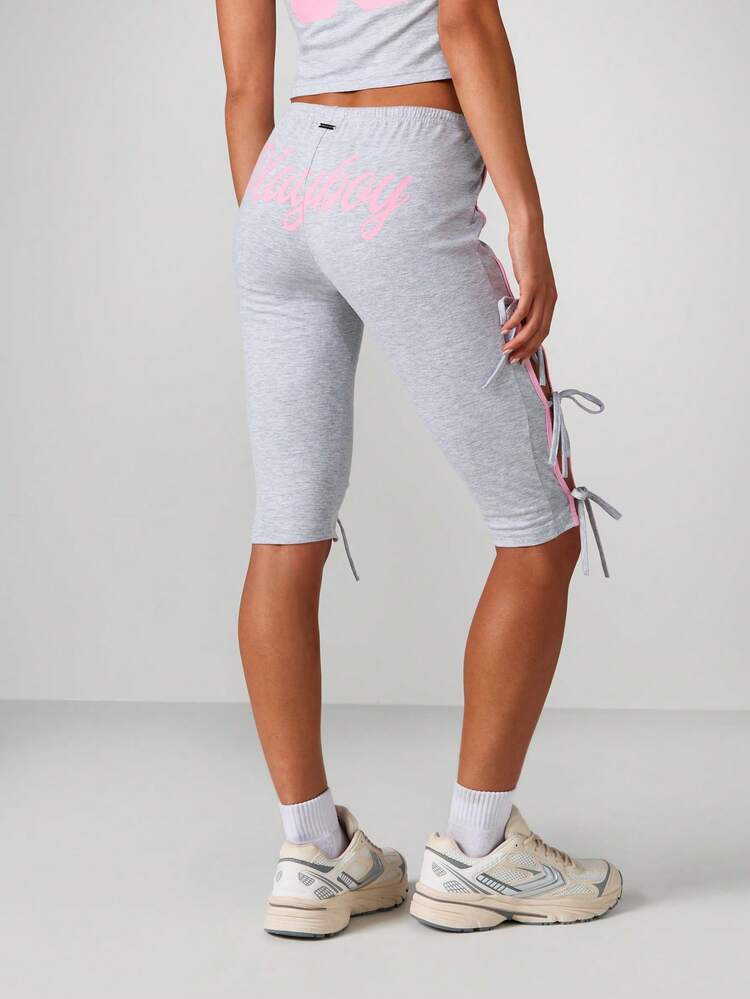 Missguided x Playboy Logo Crop Top With Bow Side Ties And Pink Accents For Casual Summer Wear