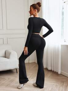 SHEIN Sports Women's Solid Color Hollow Out Cropped Top And Flare Pants Sports Suit - Black - View 2