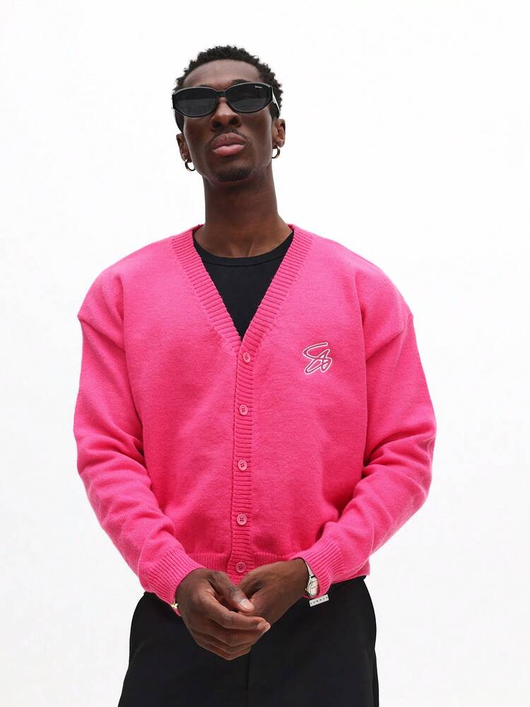 Kardigan zapinany z przodu na guziki z haftowanym logo