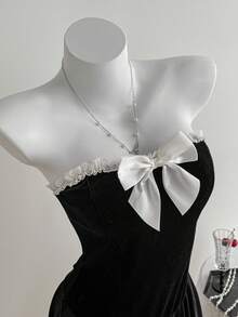 Elamini Bộ đồ hai mảnh váy ngắn chữ A hở lưng phối ren nơ nhung đen kèm áo khoác cardigan dệt kim ngắn hai mảnh, thời trang thu đông cho nữ, phong cách tối giản, đa năng, thanh lịch, cổ điển, trang phục thường ngày cho tiệc tùng - màu đen - Xem 4