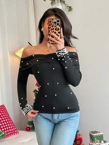Rafferiza Camiseta de manga larga con hombros descubiertos, volantes y perlas falsas, sexy y elegante, que define la cintura, para mujer en otoño y invierno, para fiestas, Navidad - Negro - Ver 5