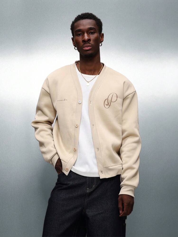 PLAYBOY X SUMWON Beigefarbene Strickjacke mit durchgehendem Reißverschluss und Logo-Print