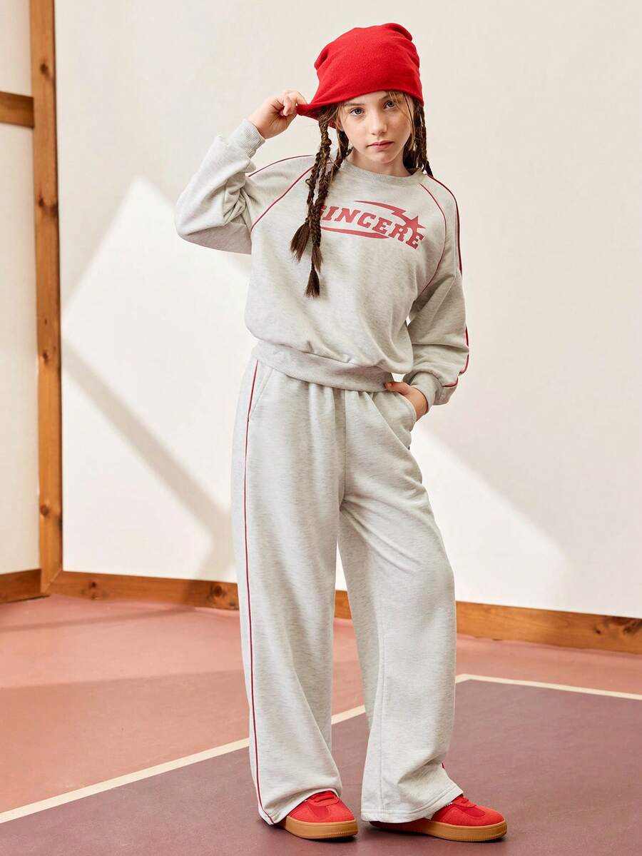 JNSQ Tween-Mädchen 2-teiliges Outfit-Set: Locker sitzendes Sweatshirt-Oberteil mit Rundhalsausschnitt und langen Ärmeln und Grafikdruck, gepaart mit einer entspannten Jogginghose mit geradem Bein, geeignet für den Alltag im Herbst/Winter, Outdoor-Aktivitäten, Urlaub, Streetwear, Partys und Lässig anlässe - Grau - Übersicht 1