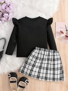 Set di maglietta a maniche lunghe nera e gonna a quadri, semplice e alla moda, per ragazze giovani