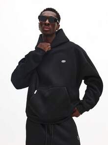 SUMWON Sudadera con capucha de ajuste cuadrado con gráficos de juegos vibrantes y capucha con cordón para uso casual en la calle - Negro - Ver 2