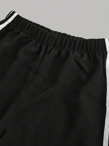 少女蝴蝶结装饰宽松黑色休闲裤，百搭时尚，适合日常穿着，秋季也适合日常/冬季穿着，街头风，居家舒适，秋冬风格。黑色宽松运动裤，适合新年、日常、庆祝活动、秋冬季穿着，轻松舒适，秋冬叠穿，时尚有型。 - 黑色 - 查看 4