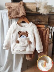 Vintaside Kids Babyboy A Two Pieces Set Of Winter Beige Double-Sided Fleece Round-Neck Long-Sleeved Top And Khaki Tapered Long Pants Comes With A Cute Three-Dimensional Bear Ear Hat. The Pocket On The Chest Has A Cute And Adorable Bear Embroidery Pattern. Made Of Plush Fabric, It Is Warm And Comfortable, Suitable For Daily Outings Such As Going To School, Taking A Vacation, Learning To Walk, Relaxing At Home, And Attending Parties
