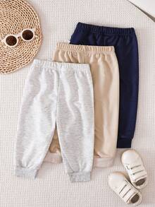 SHEIN Vintaside Kids 3-Pack Newborn Baby Boy/Girl All-Match Solid Color Footie Pants (Black, White, Blue), Versatile For Home, Outdoor Play, Travel & More, Value Pack Baby Boy Joggers Pants Baby Boys Bottoms Baby Trousers