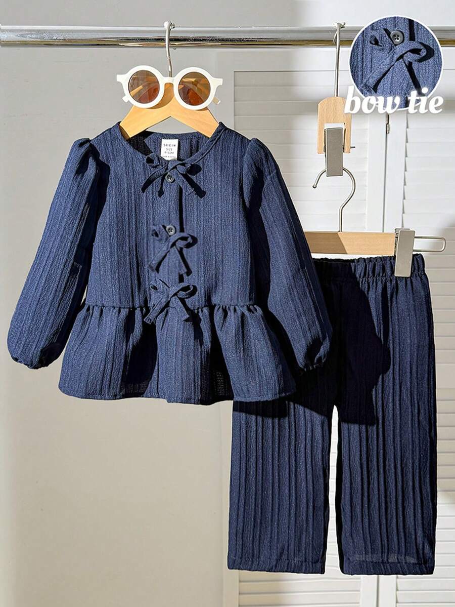 SHEIN Playful Pals Baby Girl Spring/Autumn Back To School Casual Fashion 2-Piece Set, Navy Blue Solid Color Shirt With Ruffle Hem And Wave Texture Fabric Paired With Navy Blue Casual Pants, Cute And Simple Outfit For Daily Outings And Photo Shoots Fall Winter - Royal Blue - View 1