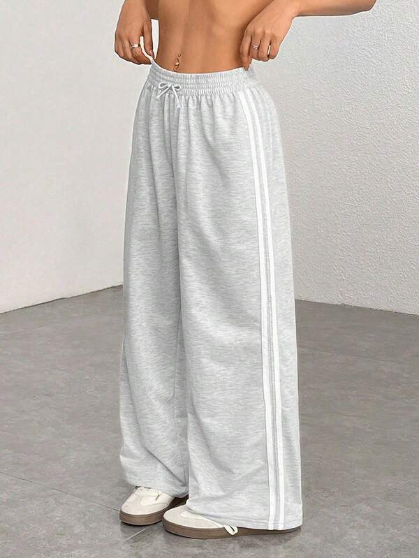 SHEIN Tween Girls' Loose Fit Floral Print Sweatpants With Ribbon, Casual & Fashionable For Everyday Wear Wide Leg Sweatpants Grey Sweatpants Sweatpants With Stripes Wide Leg Pants Loose Sweatpants Fall Winter