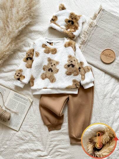 Vintaside Kids Baby Boy This Two Pieces Set Of Winter Milk White Brown Bear Plush Warm Round-Neck Long-Sleeved Top And Tapered Long Pants Comes With A Plush Hat From The Same Series. The Top Is Fully Printed With Soft And Cute Brown Bear Patterns, And The Hat Has Bear Ear Decorations On Both Sides, Which Is Very Cute And Playful.