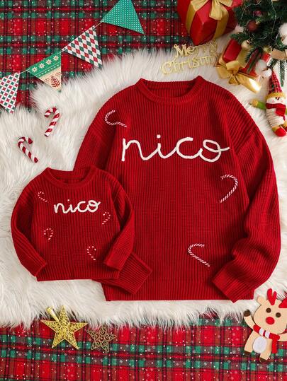 Manfinity RelaxMax Suéter navideño para hombres con estampado de dibujos animados de la familia, de cuello redondo, manga larga, color rojo, de estilo casual y elegante. Suéter de punto con gráfico para hombres, jersey para hombre, suéter de invierno rojo para hombres.