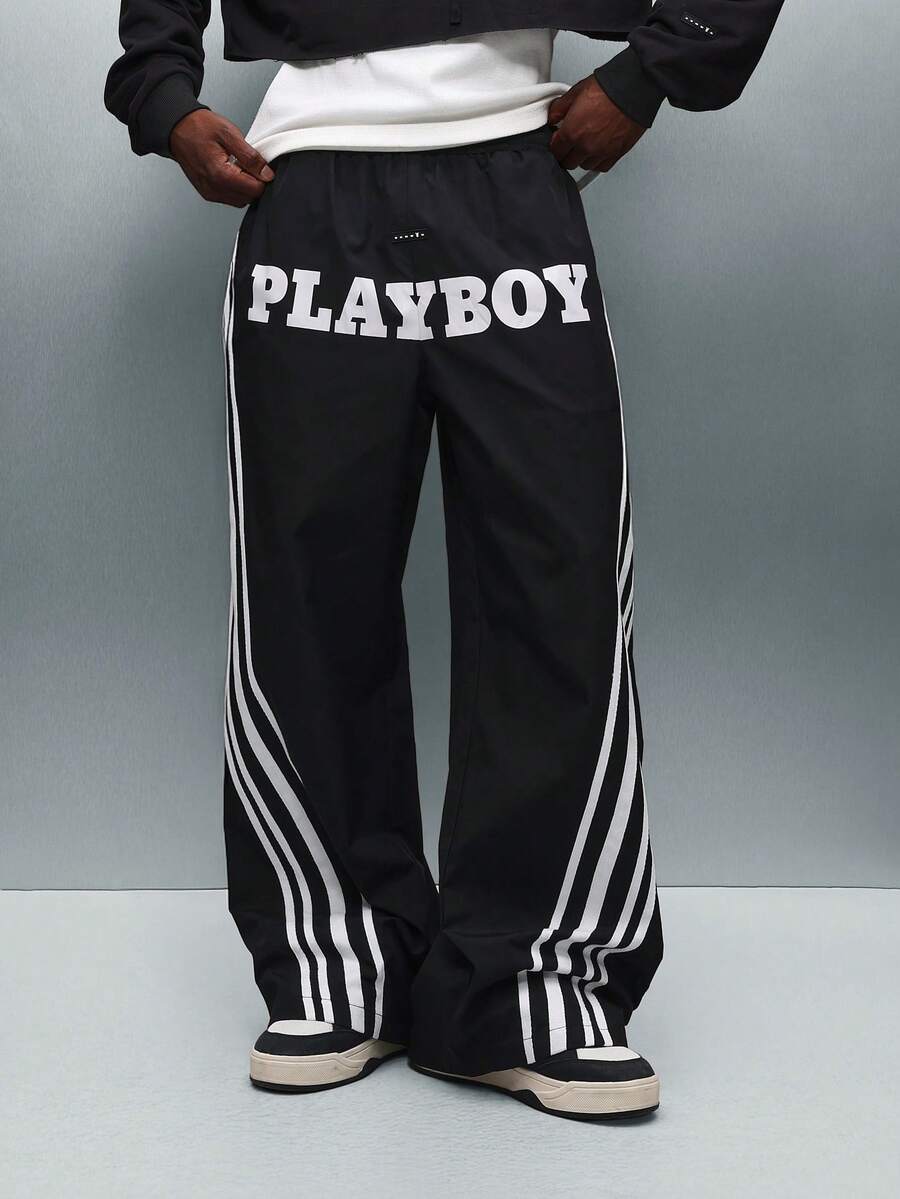 PLAYBOY X SUMWON 阔腿运动裤，带侧条纹和品牌标志印花，适合休闲街头服饰冬季舒适家居服 - 黑色 - 查看 1