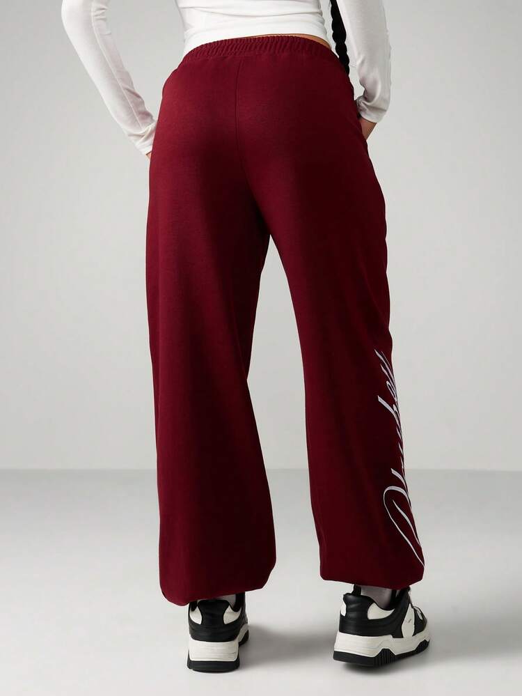 Missguided x Playboy Cuffed Joggers With Logo Emblem And Drawstring Waistband For Casual Winter Comfort