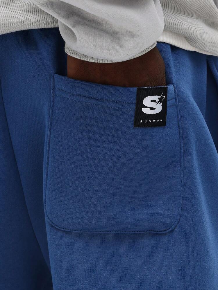 Pantaloni della tuta a gamba dritta con logo stampato