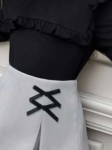 SHEIN Elladie kids Conjunto de camiseta de manga larga acanalada negra linda con falda con decoración de lazo y bajo dividido para niñas, conjunto de camiseta de otoño/invierno - Negro - Ver 3