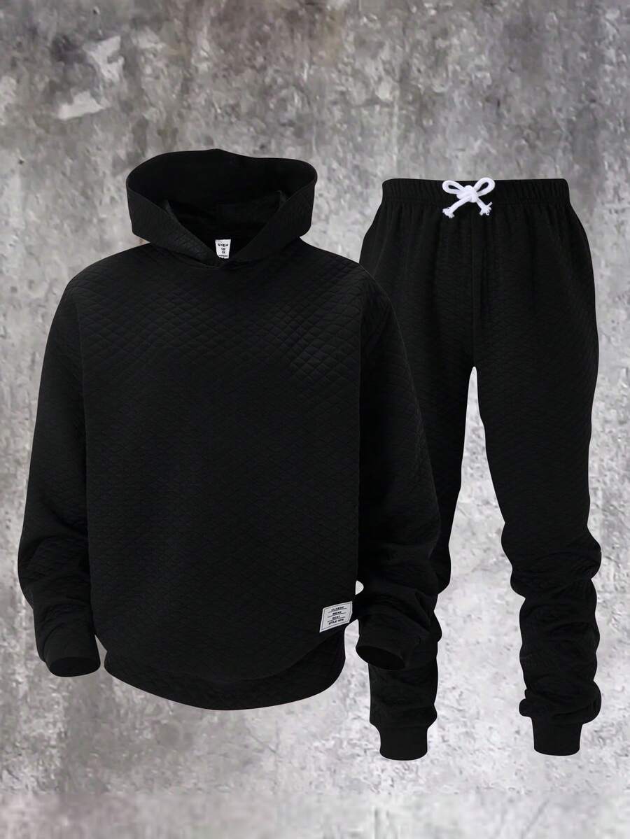 SHEIN Conjunto de 2 peças de moletom com capuz solto e calça de moletom com cordão para meninos adolescentes, casual, para o dia a dia, confortável, com letras, patch, conjunto de agasalho de malha - Preto - Ver 1