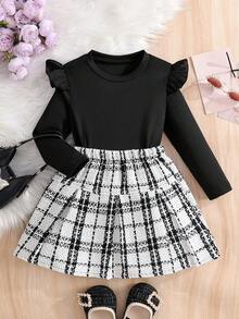 Set di maglietta a maniche lunghe nera e gonna a quadri, semplice e alla moda, per ragazze giovani