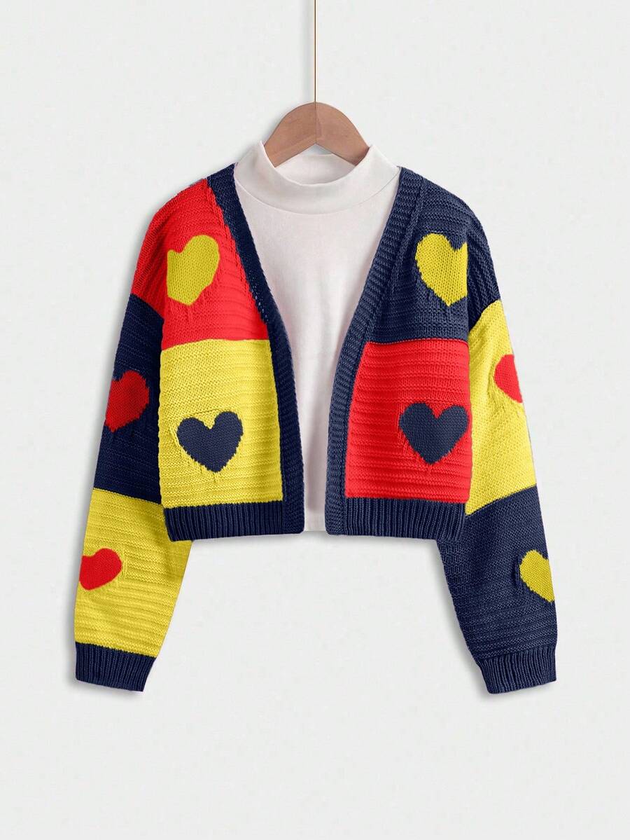 SHEIN Cardigan lavorato a maglia per ragazze pre-adolescenti con blocchi di colore a forma di cuore in rosa e viola, che presentano uno stile dolce e carino. Progettato per le ragazze pre-adolescenti, ha maniche lunghe regolari e uno spessore moderato, ideale per la primavera e l'autunno. Come categoria di cardigan lavorati a maglia, è una scelta ideale per l'abbigliamento casual quotidiano, soddisfacendo l'esigenza di un abbigliamento semplice e chiaro per tutti i giorni. - Multicolore - Visualizzare 1