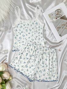 SHEIN Conjunto de pijama cómodo y casual de 2 piezas (camiseta y pantalones cortos) con estampado floral y lazo para niña preadolescente, color rosa