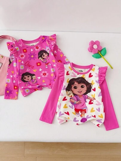 DORA | SHEIN Conjunto de 2 piezas de camiseta de manga larga ajustada con estampado de corazón y figura de dibujos animados, y pantalones para niñas jóvenes