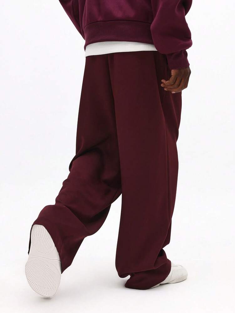 Pantalones holgados con pliegues y cordón