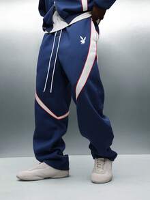 PLAYBOY X SUMWON Bunny Wide Leg Navy Sweatpants With Contrast Stripe Detail Casual Drawstring Joggers - Blue and White - View 4